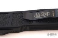106-23-TACT Makora D/E Serrated Edge OTF DLC Black Tactical