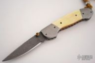 Damascus Gold Lip Pearl Lockback