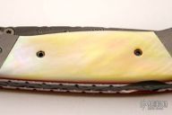 Damascus Gold Lip Pearl Lockback