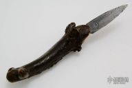 Carved Damascus Thumb Dagger