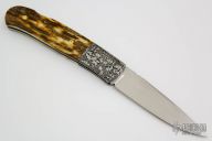 Damascus and Mammoth Lockback