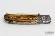 Damascus and Mammoth Lockback