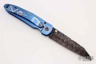Engraved Damascus Framelock