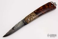 Engraved Damascus Lockback