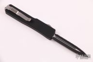  147-3 UTX-70 - D/E Black Full Serrated