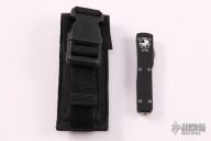  147-3 UTX-70 - D/E Black Full Serrated