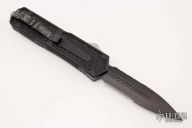 Scarab -  D/E Black Serrated #00902 09/2006