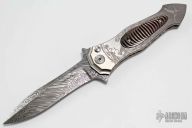 Twist Tighe - Damasteel and Engraved