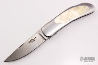 Gold Lip Pearl Interframe Lockback